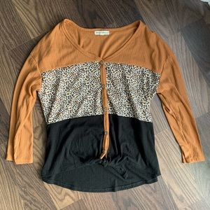 Above and Beyond leopard color block top